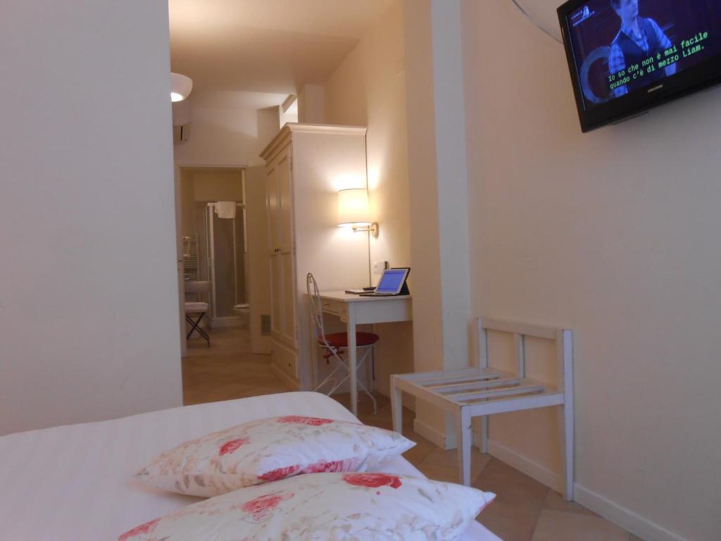 Łóżko lub łóżka w pokoju w obiekcie Hotel Atlantic