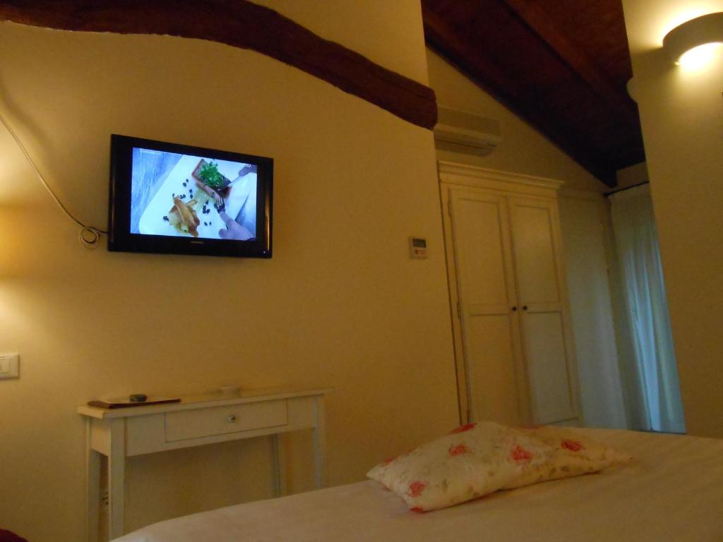 Telewizja i/lub zestaw kina domowego w obiekcie Hotel Atlantic