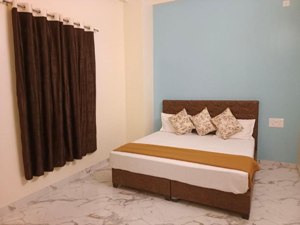 Postel nebo postele na pokoji v ubytování Hotel Sai 9 Heaven