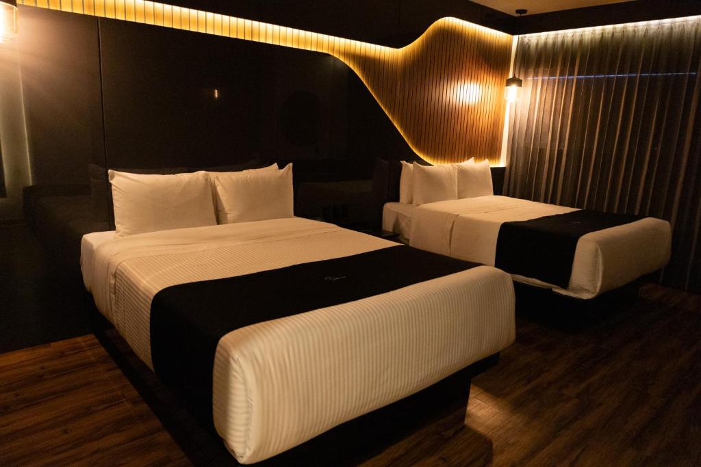Postel nebo postele na pokoji v ubytování Hotel Yoru