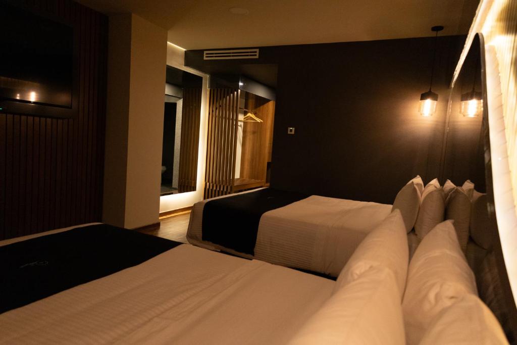 Postel nebo postele na pokoji v ubytování Hotel Yoru