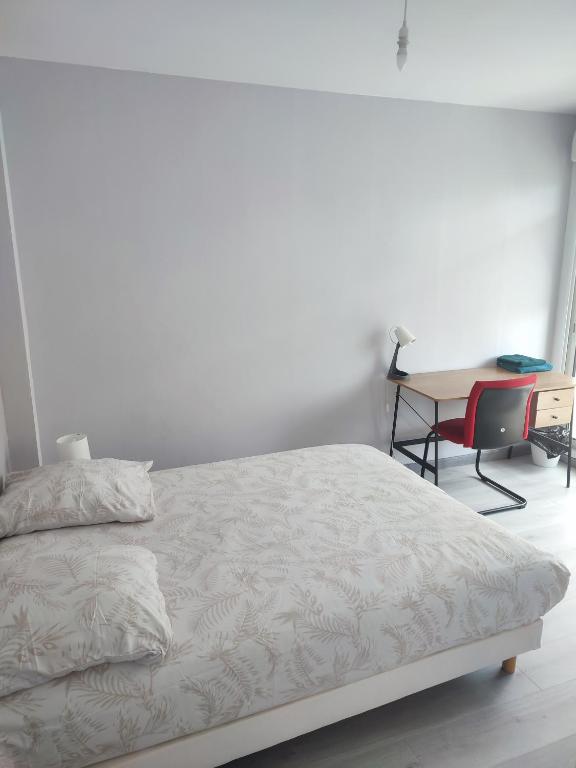 Postel nebo postele na pokoji v ubytování Appartement T4