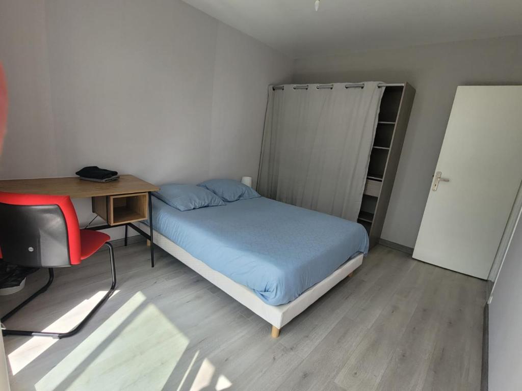 Postel nebo postele na pokoji v ubytování Appartement T4