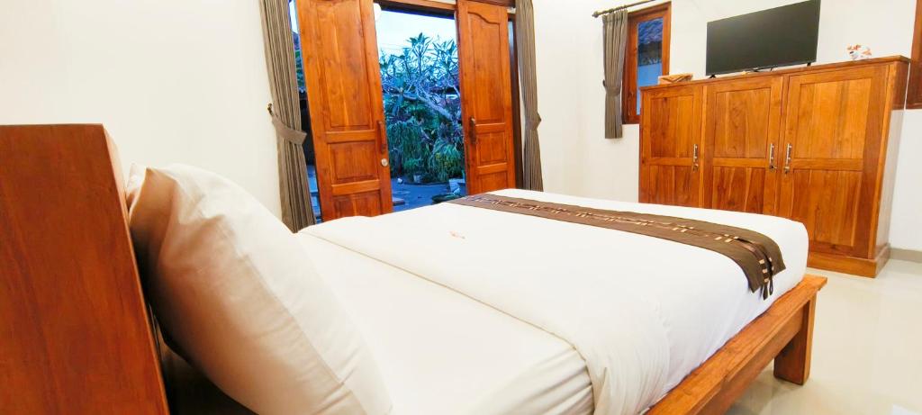 Postel nebo postele na pokoji v ubytování Mayka House