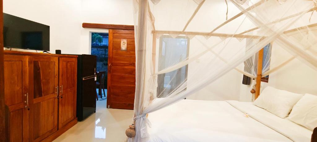 Postel nebo postele na pokoji v ubytování Mayka House