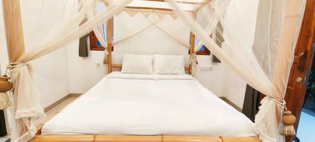 Postel nebo postele na pokoji v ubytování Mayka House