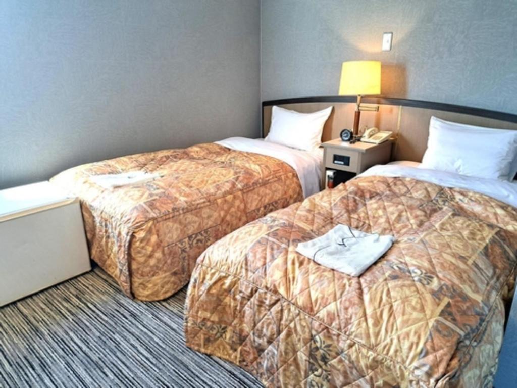 Ένα ή περισσότερα κρεβάτια σε δωμάτιο στο Hotel Tetora Higashimuroran - Vacation STAY 75836v