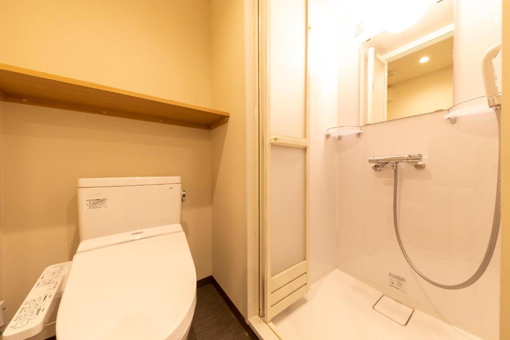 Koupelna v ubytování Dormy Inn Maebashi