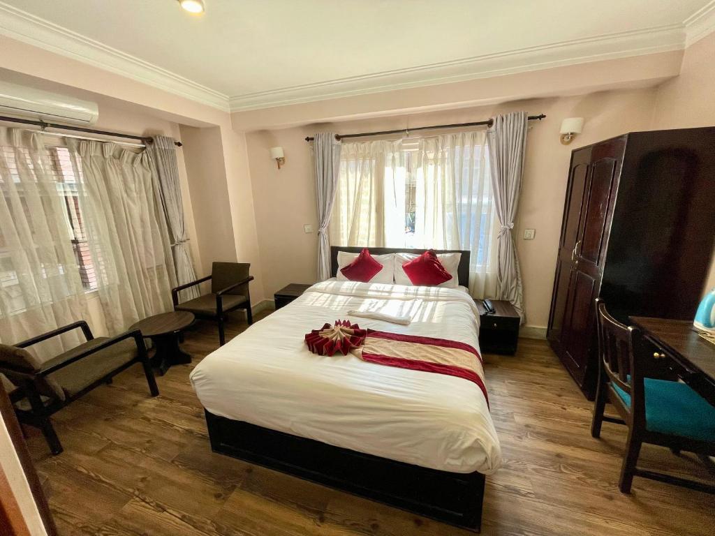 Postel nebo postele na pokoji v ubytování Hotel Liv Inn