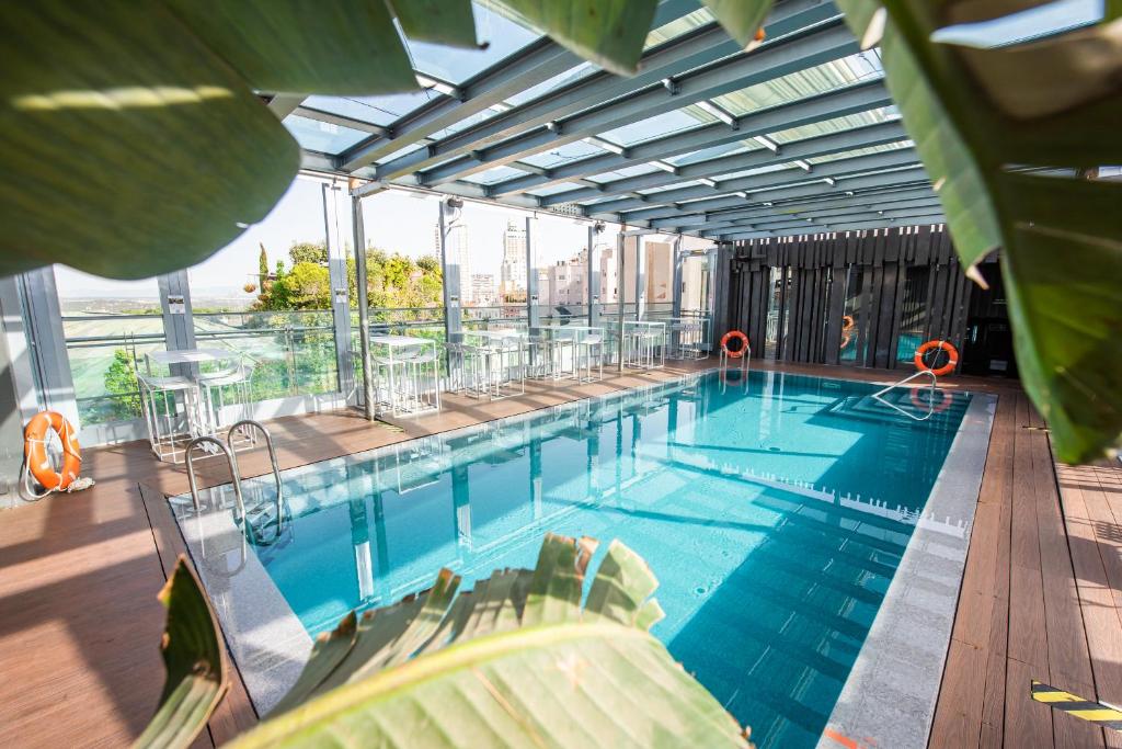 Bazén v ubytování Inhala Hotel Garden nebo v jeho okolí