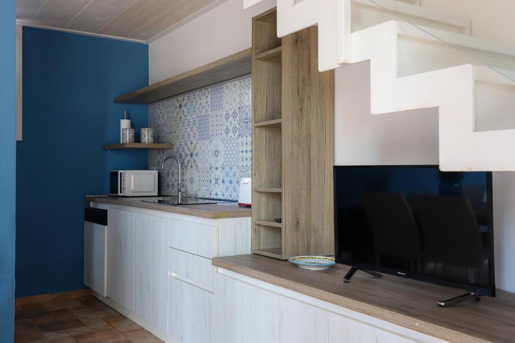 Kuchyň nebo kuchyňský kout v ubytování Le Querce Apartments