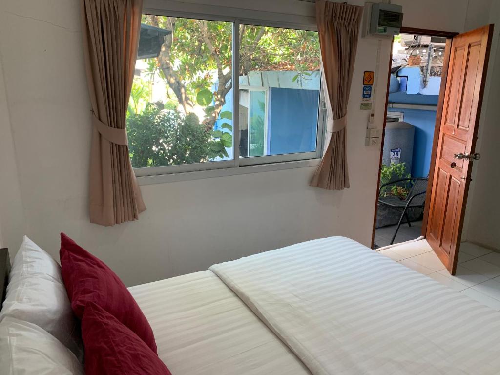 Postel nebo postele na pokoji v ubytování D Heart Homestay