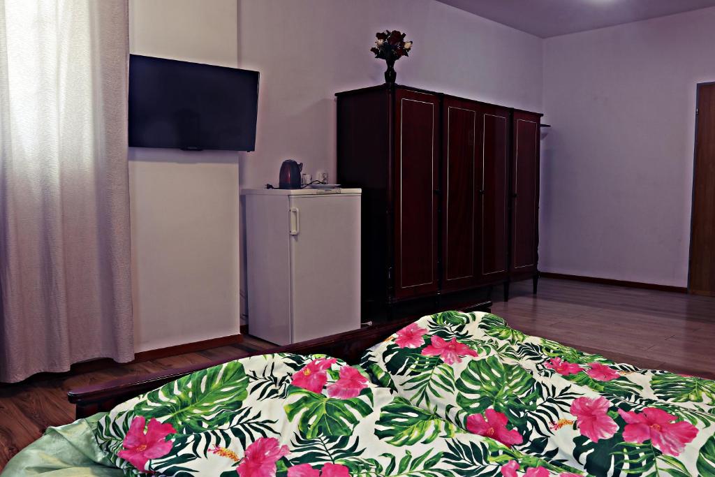 Postel nebo postele na pokoji v ubytování Hotel Dworek