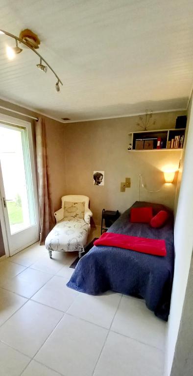 Postel nebo postele na pokoji v ubytování Malpas125 chambres