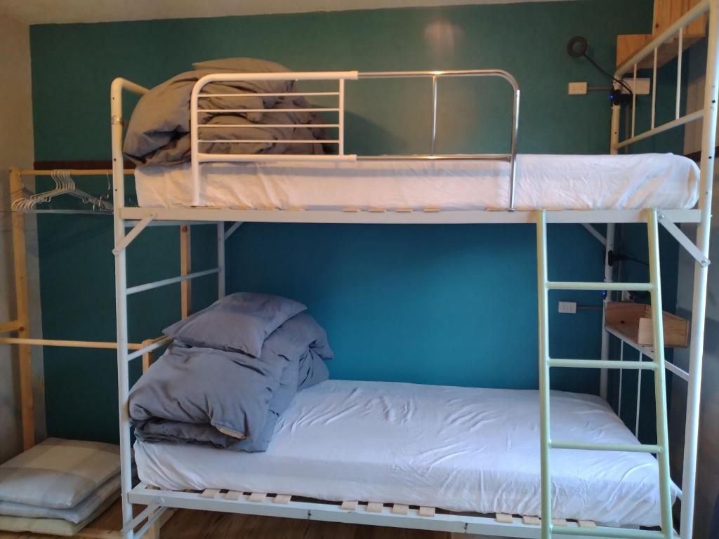 Postel nebo postele na pokoji v ubytování Toyako Guest House Ponkotan
