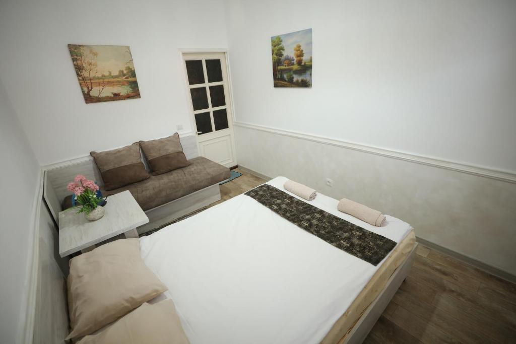 Postel nebo postele na pokoji v ubytování U ASHOTA