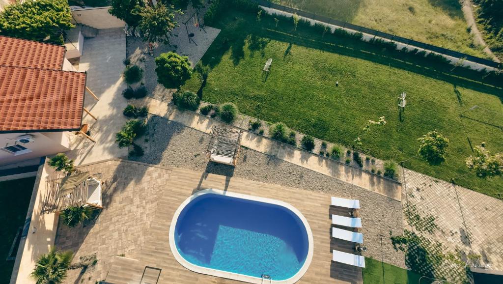 an overhead view of a swimming pool in a yard at Old Tower in Stolac