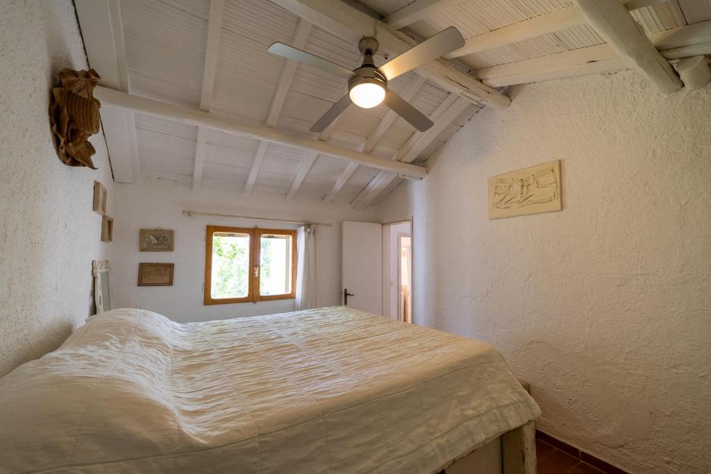 Posteľ alebo postele v izbe v ubytovaní Cottage Pura Vigna immerso nella natura vicino al mare