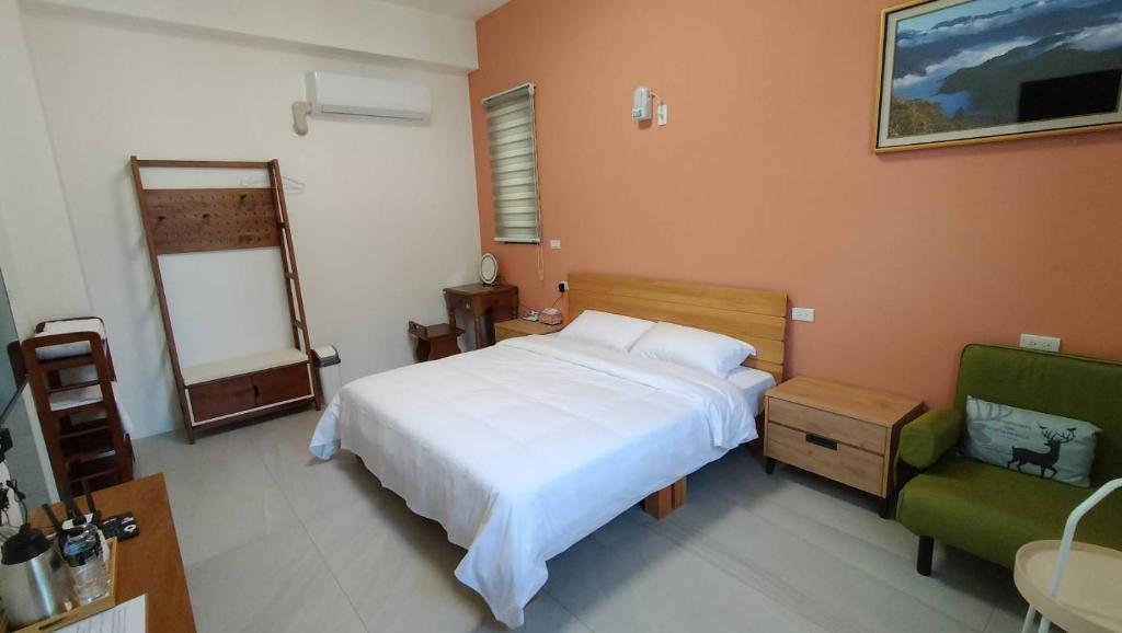 Postel nebo postele na pokoji v ubytování Liangchen B&B