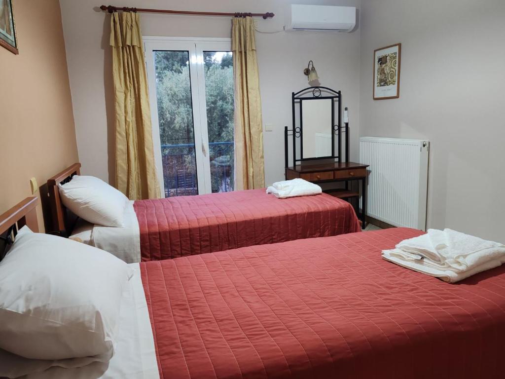 Postel nebo postele na pokoji v ubytování Villa Mirella