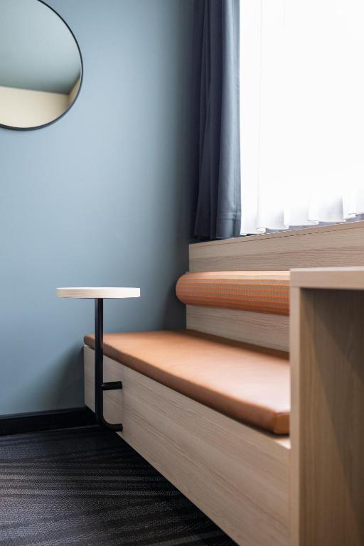 Postel nebo postele na pokoji v ubytování Citybox Brussels