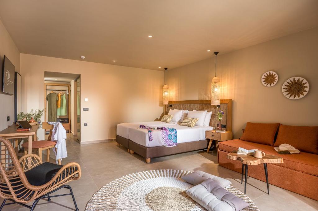 Postel nebo postele na pokoji v ubytování Hotel Pyriá