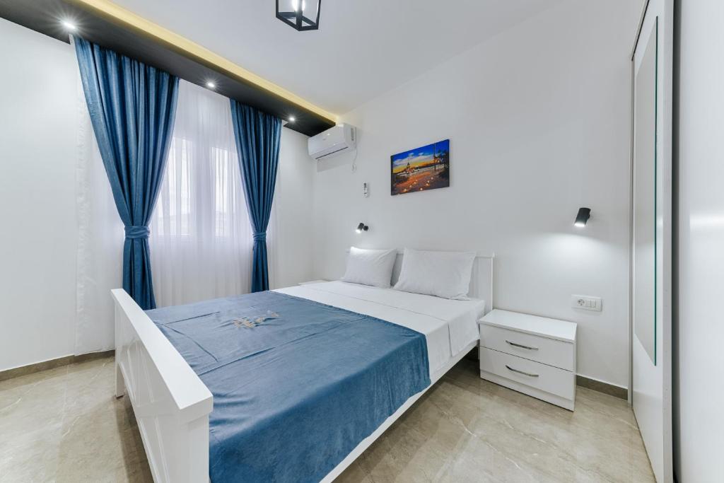 Postel nebo postele na pokoji v ubytování Lux DAM Apartments