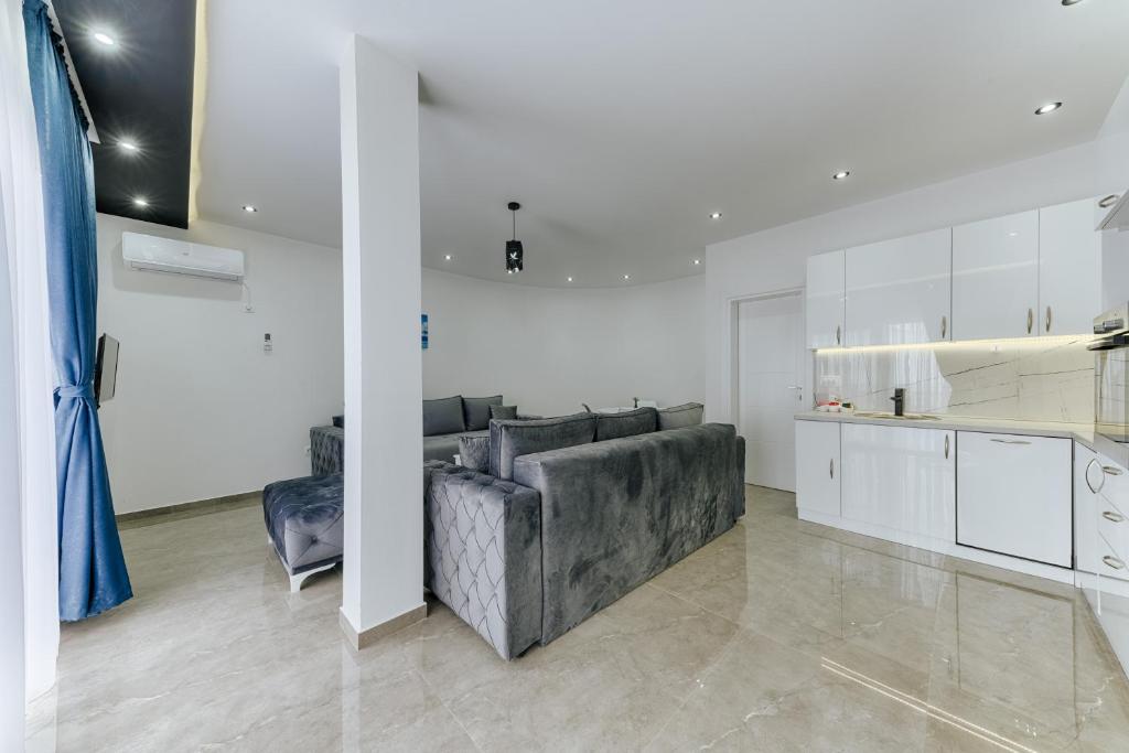Kuchyň nebo kuchyňský kout v ubytování Lux DAM Apartments