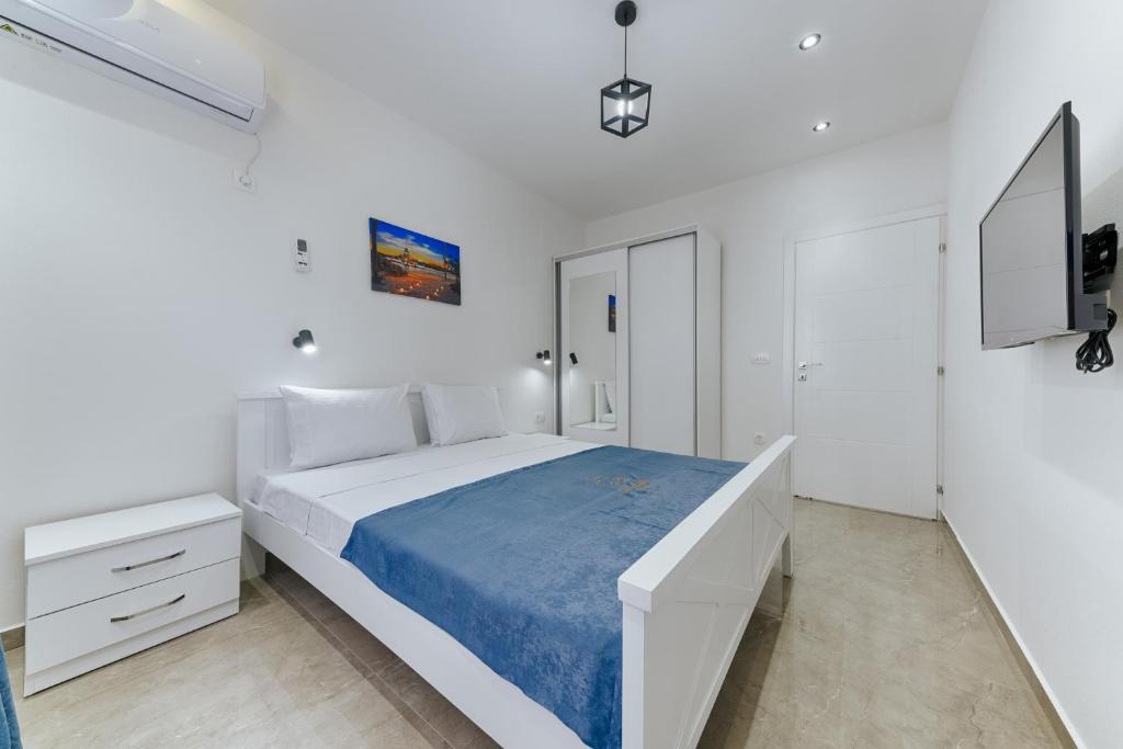 Postel nebo postele na pokoji v ubytování Lux DAM Apartments