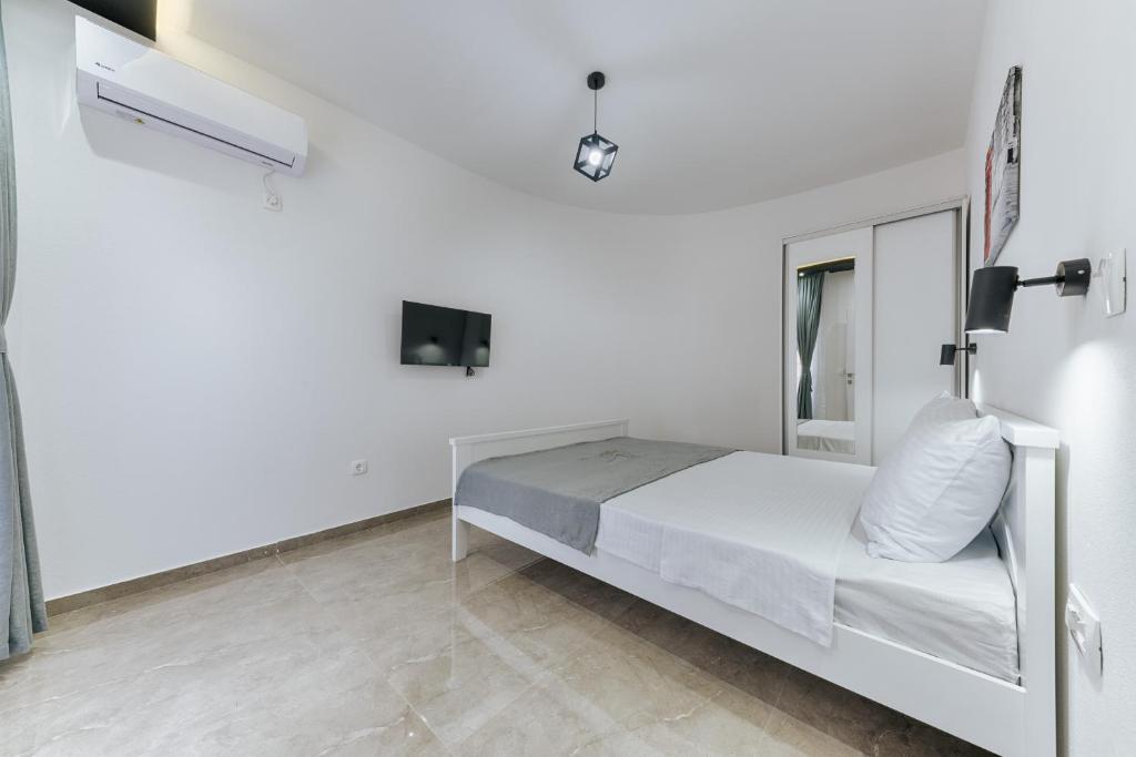 Postel nebo postele na pokoji v ubytování Lux DAM Apartments
