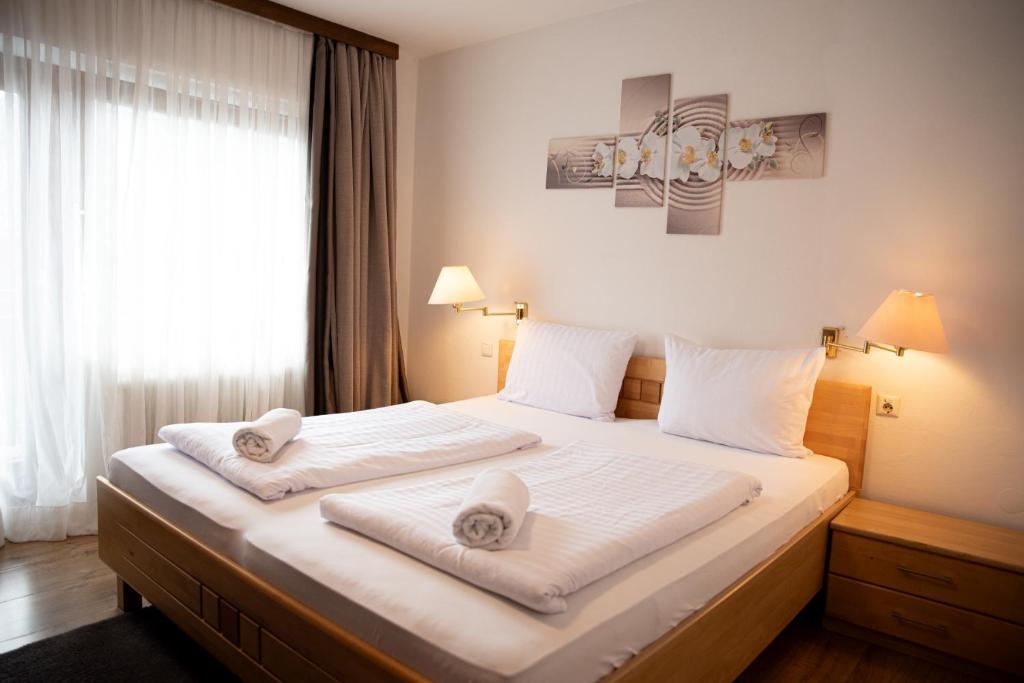 Postel nebo postele na pokoji v ubytování Haus Maria