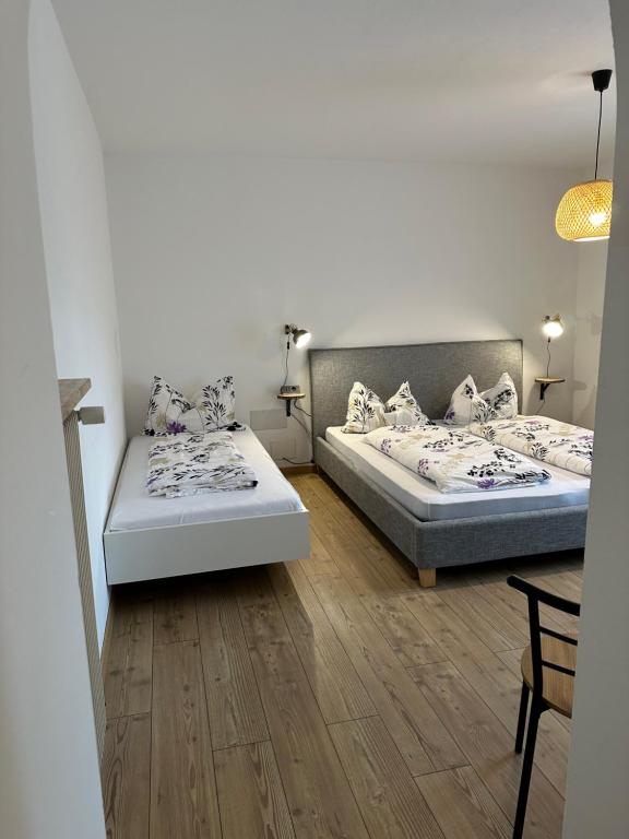 Postel nebo postele na pokoji v ubytování Dolomites Smart Holidays