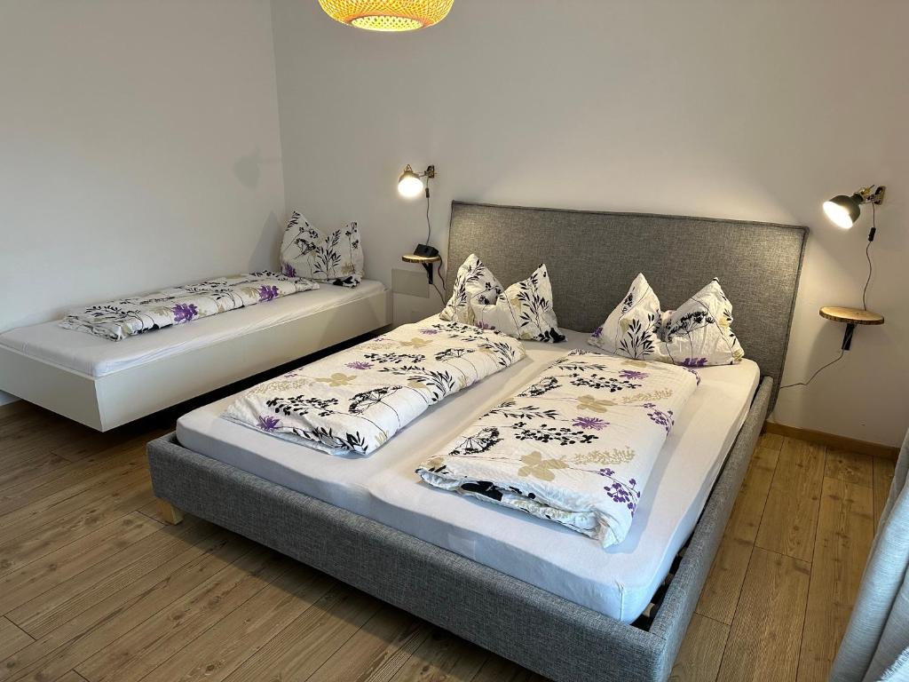 Postel nebo postele na pokoji v ubytování Dolomites Smart Holidays