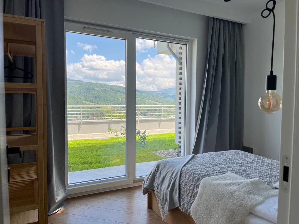 Nespecifikovaný výhled na hory nebo výhled na hory při pohledu z apartmánu