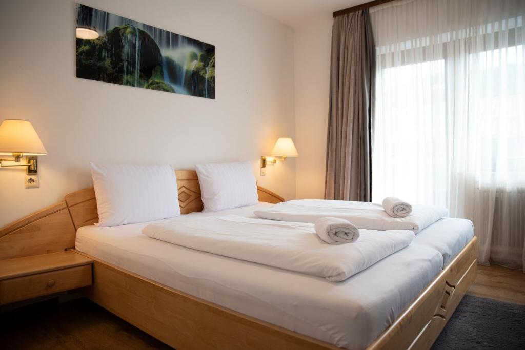 Postel nebo postele na pokoji v ubytování Haus Maria