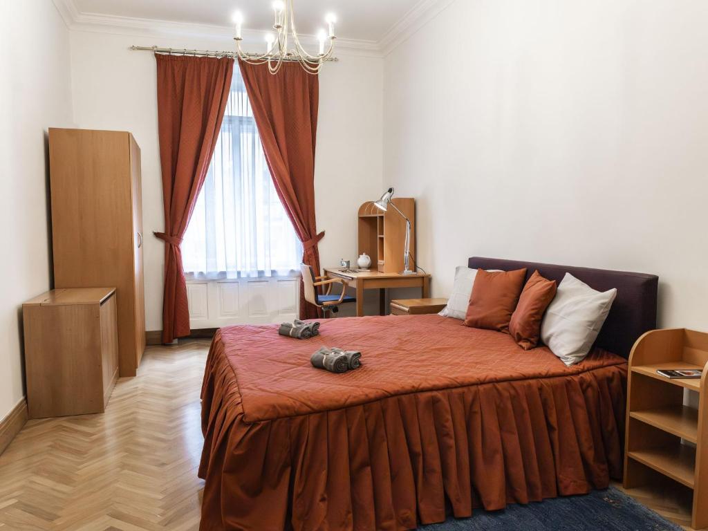 Postel nebo postele na pokoji v ubytování Apartment Manes Residence by Interhome