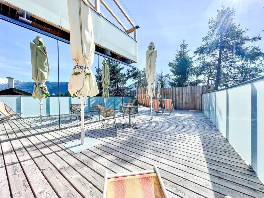 Balkón nebo terasa v ubytování Chalet Panorama Lodge by Interhome