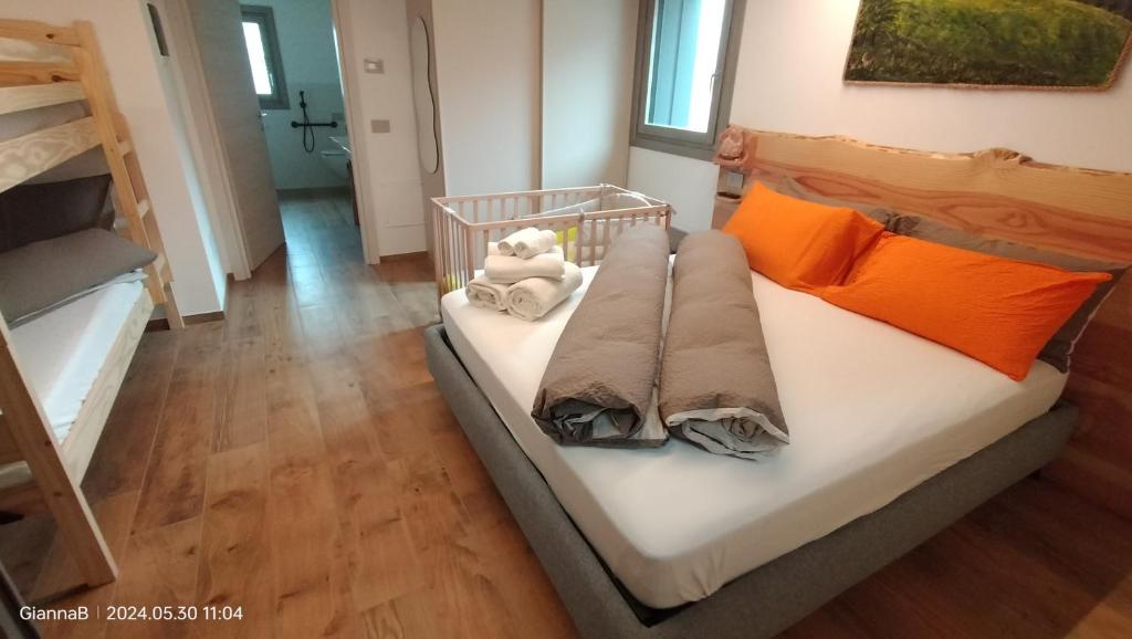 Postel nebo postele na pokoji v ubytování beb Aria di Montagna