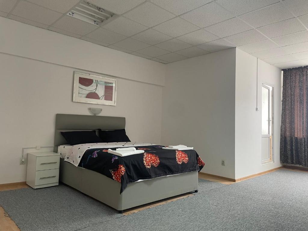 Katil atau katil-katil dalam bilik di Studio Rentals