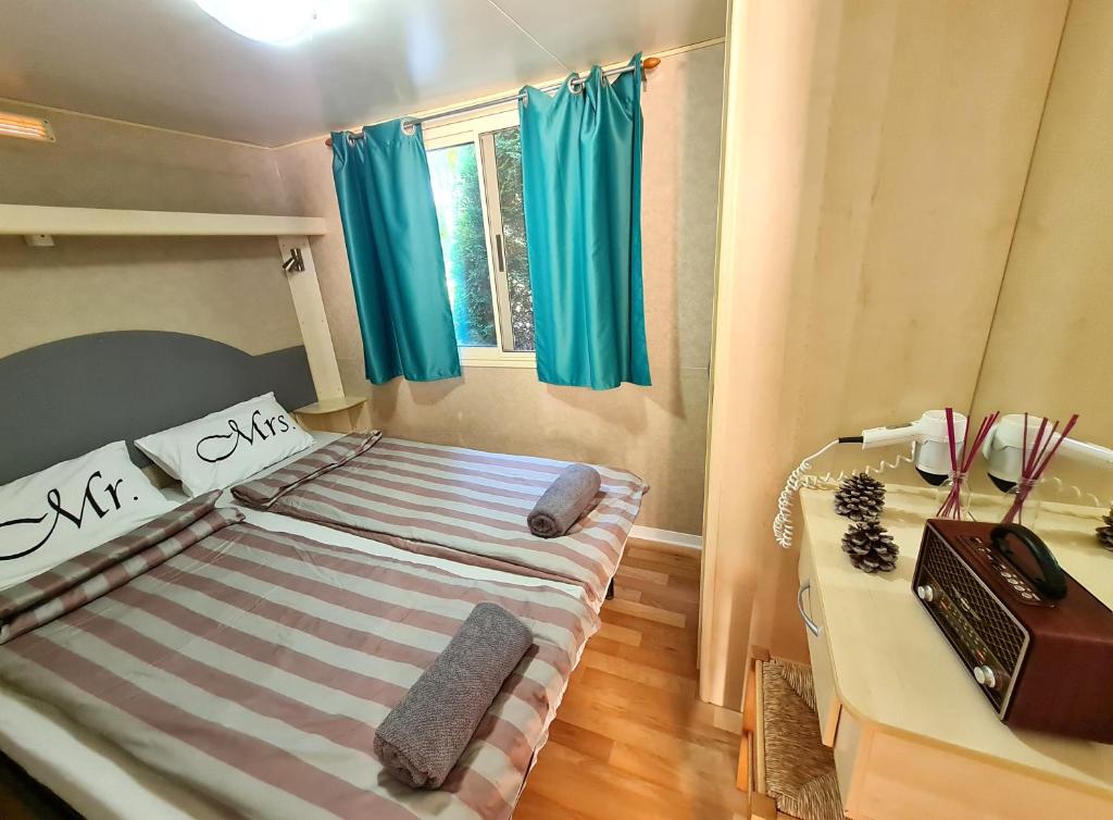 Postel nebo postele na pokoji v ubytování Tó Szálló