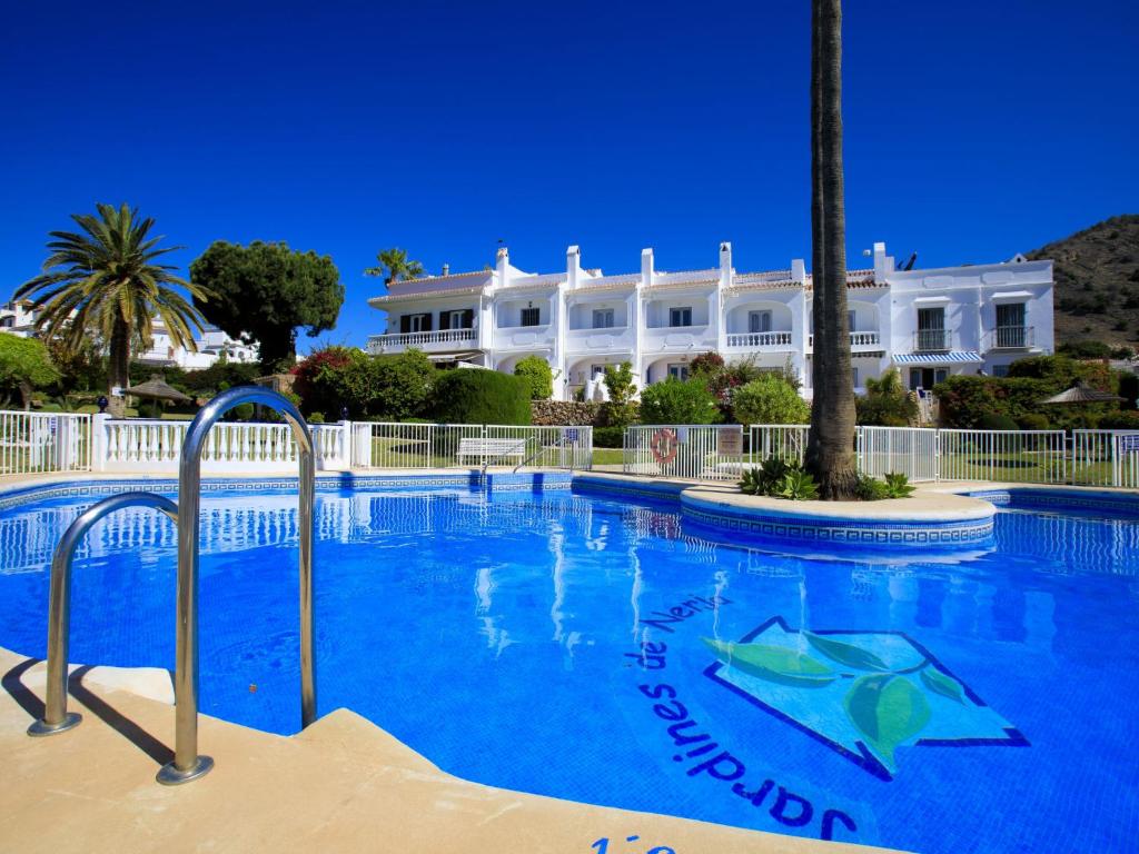The swimming pool at or close to Holiday Home Jardines de Nerja by Interhome