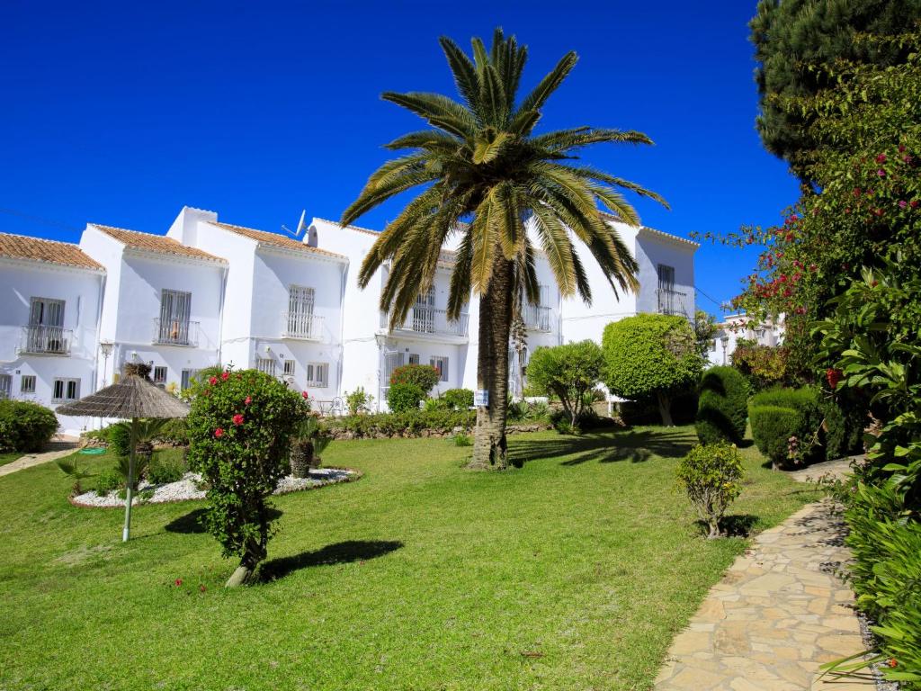 A garden outside Holiday Home Jardines de Nerja by Interhome