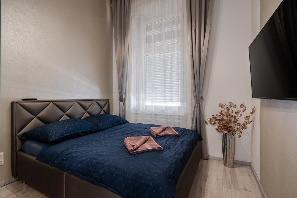 Postel nebo postele na pokoji v ubytování Király 35 Luxury Apartment with free parking