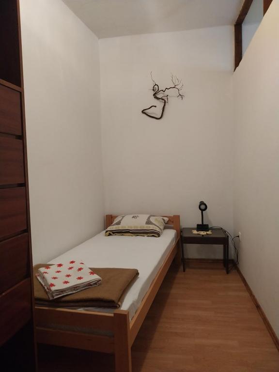 Łóżko lub łóżka w pokoju w obiekcie Apartmani Mile