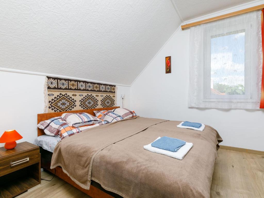 Postel nebo postele na pokoji v ubytování Apartment Kemping by Interhome