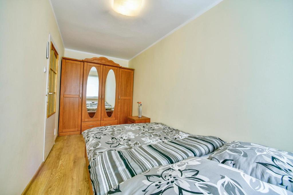 Posteľ alebo postele v izbe v ubytovaní Apartament u Joli w Kolobrzegu Podczele - 2 sypialnie, 50m2, wifi i parking za darmo!