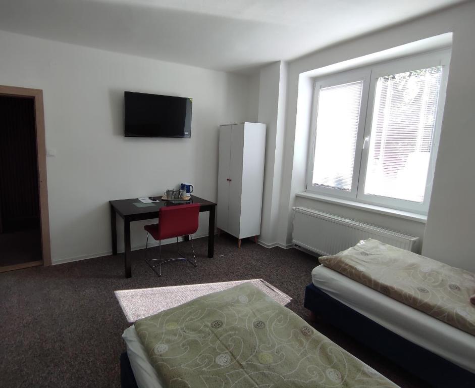 A bed or beds in a room at Hostel 26