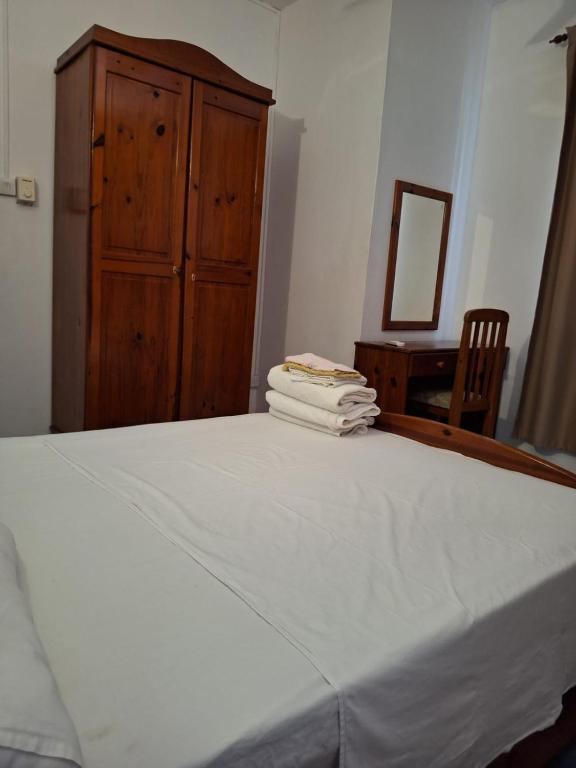 Postel nebo postele na pokoji v ubytování Ayru residence