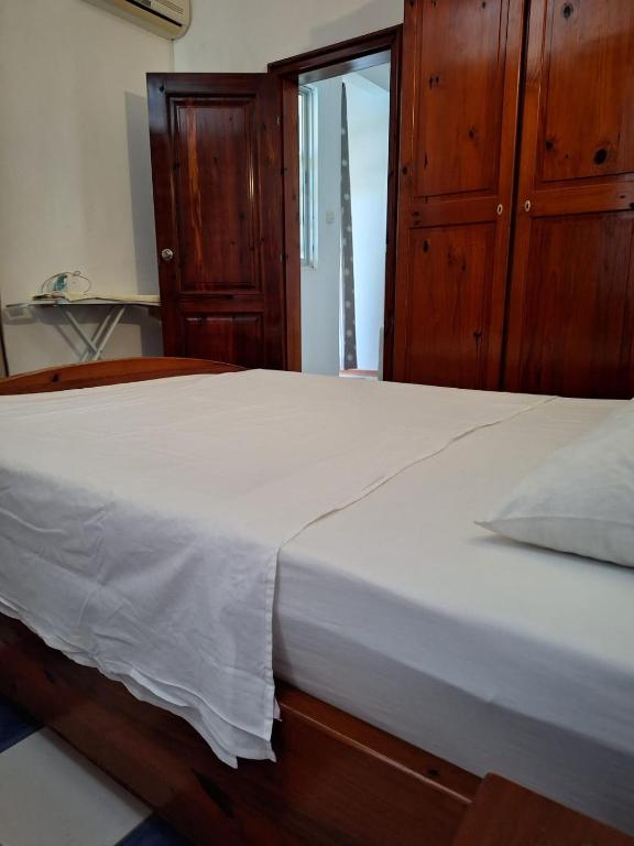 Postel nebo postele na pokoji v ubytování Ayru residence