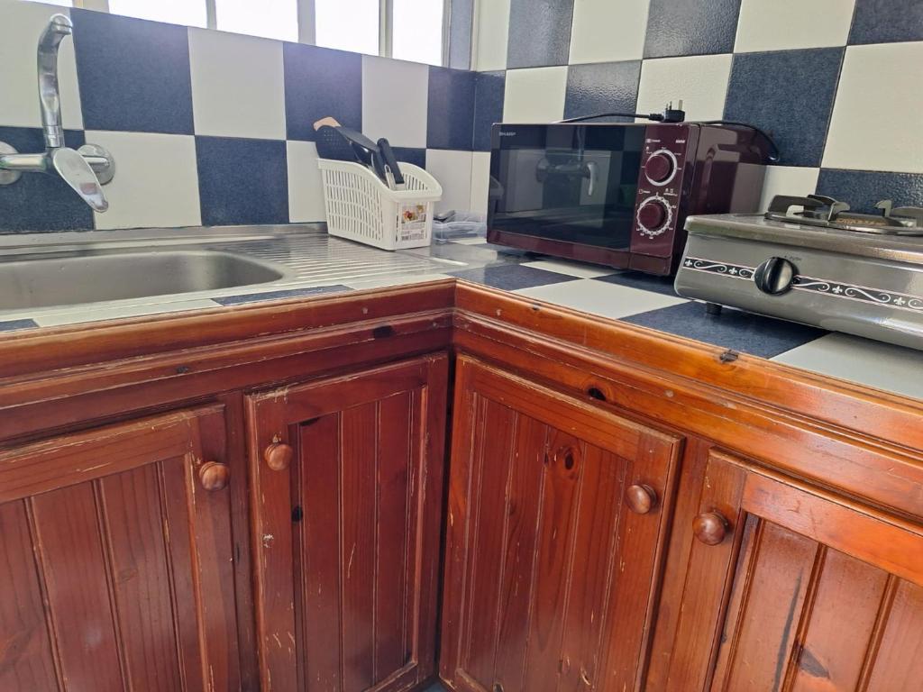 Kuchyň nebo kuchyňský kout v ubytování Ayru residence